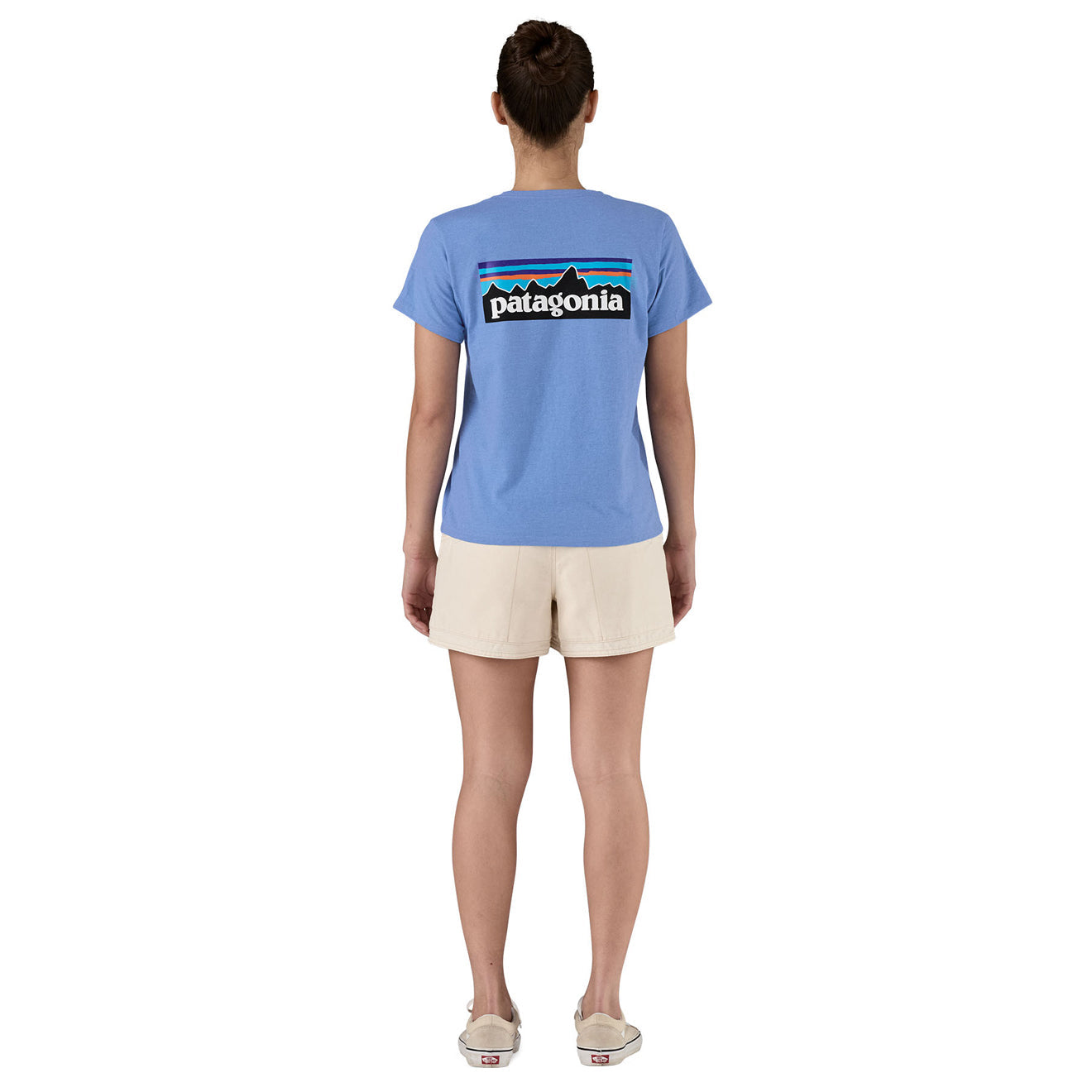Woman wearing Patagonia P-6 logo t-shirt in abundant blue, back view