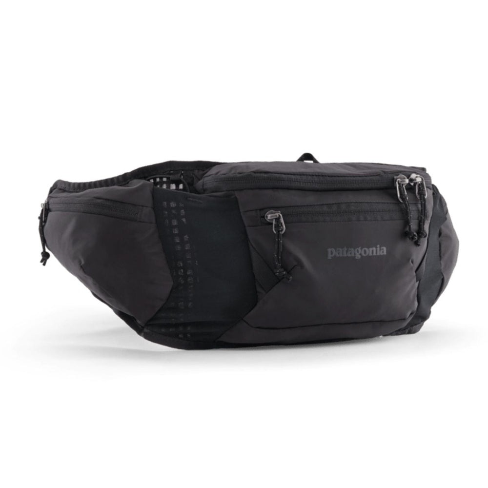 Patagonia Dirt Roamer black waist pack with multiple compartments and adjustable strap