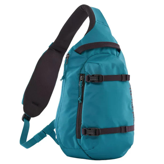 Patagonia Atom Sling 8L backpack in teal blue with black straps and buckles