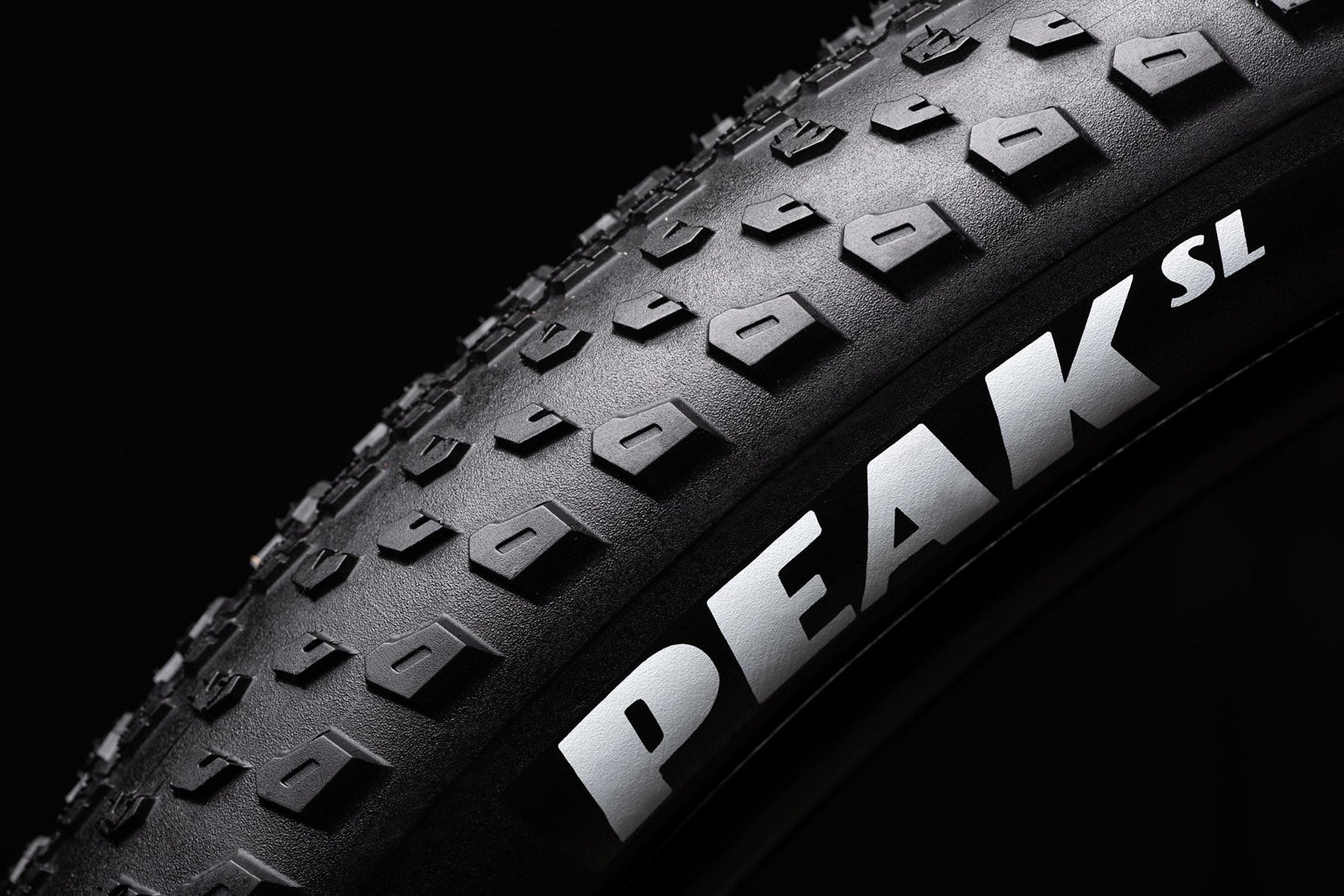 Goodyear Peak SL black bicycle tire showing tread pattern and sidewall branding