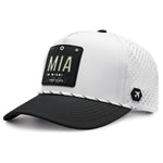 White Miami MIA trucker hat with black brim and perforated design
