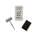 Lezyne Classic Tubeless Kit with insertion tool and rubber strips on white background