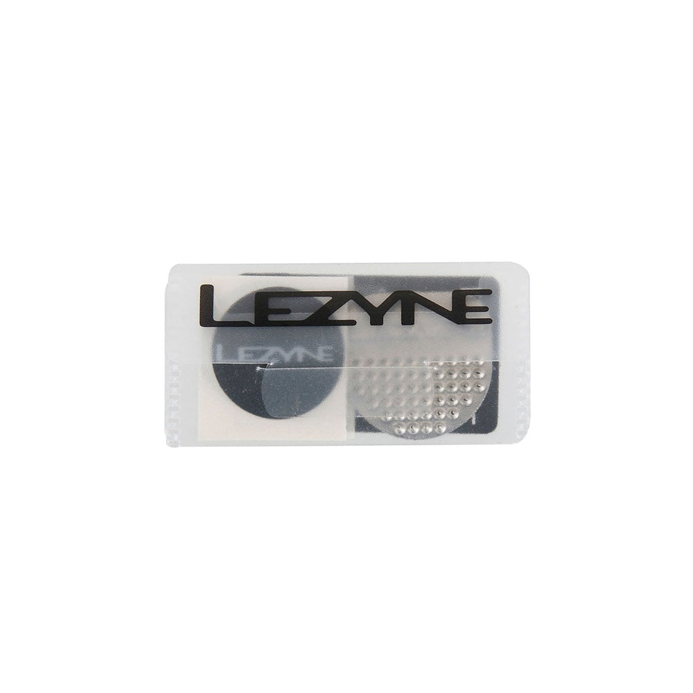 Lezyne Smart Patch Kit in clear packaging with tire repair patches