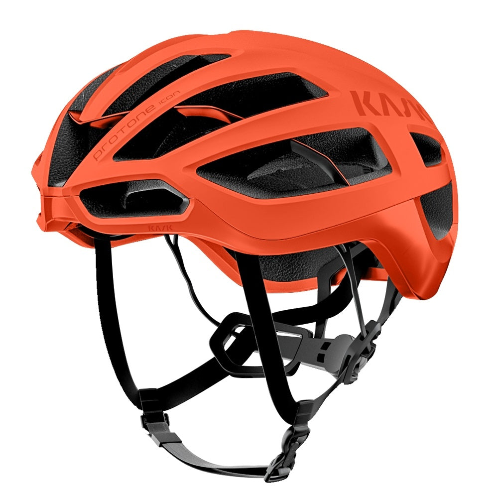 KASK Protone Icon cycling helmet in bright orange matte finish with ventilation vents