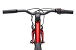Front-facing handlebar view of Cannondale Kids Quick C2 showing stem, grips, and brake levers