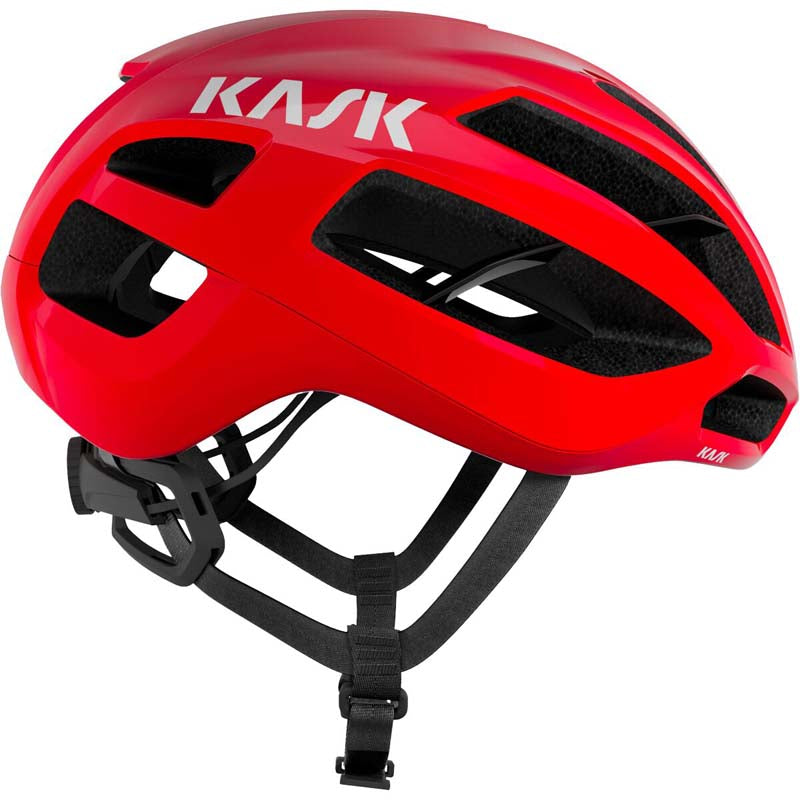 Kask Protone cycling helmet in red with black ventilation panels and adjustable straps