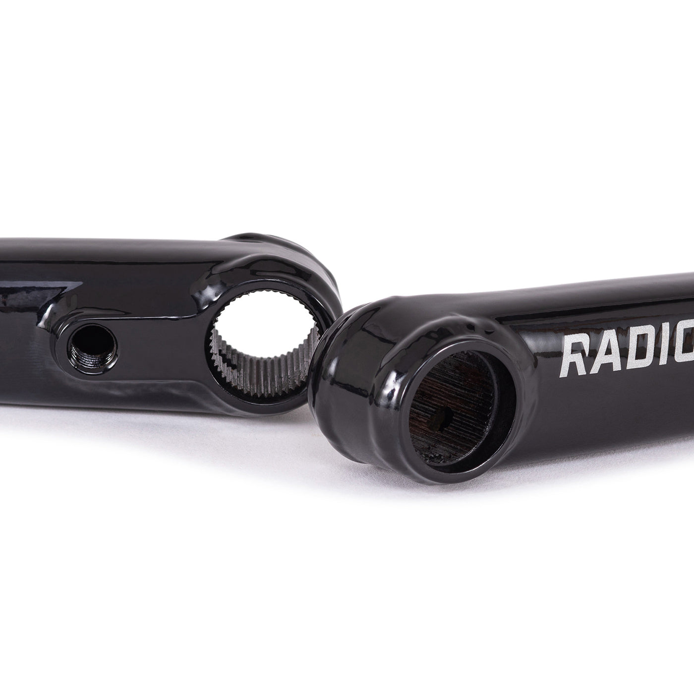 Radio brand black bicycle cranks with splined interface on white background
