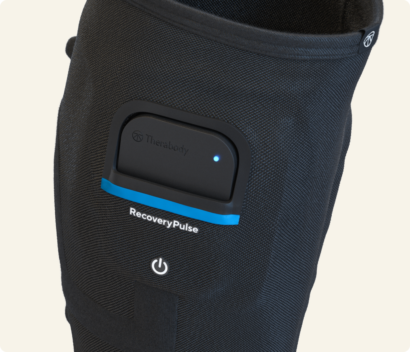 Therabody RecoveryPulse calf compression device in black with blue accent stripe and power button