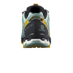 Salomon XA Pro 3D trail running shoe heel view in mint green and yellow colorway