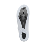 Bottom view of Shimano RC8 white cycling shoe showing carbon sole with cleat mounting points