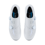 Top-down view of Shimano RC8 white cycling shoes pair showing Shimano insoles and BOA dials