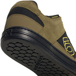Five Ten Freerider MTB shoe in olive green showing detailed sole grip pattern