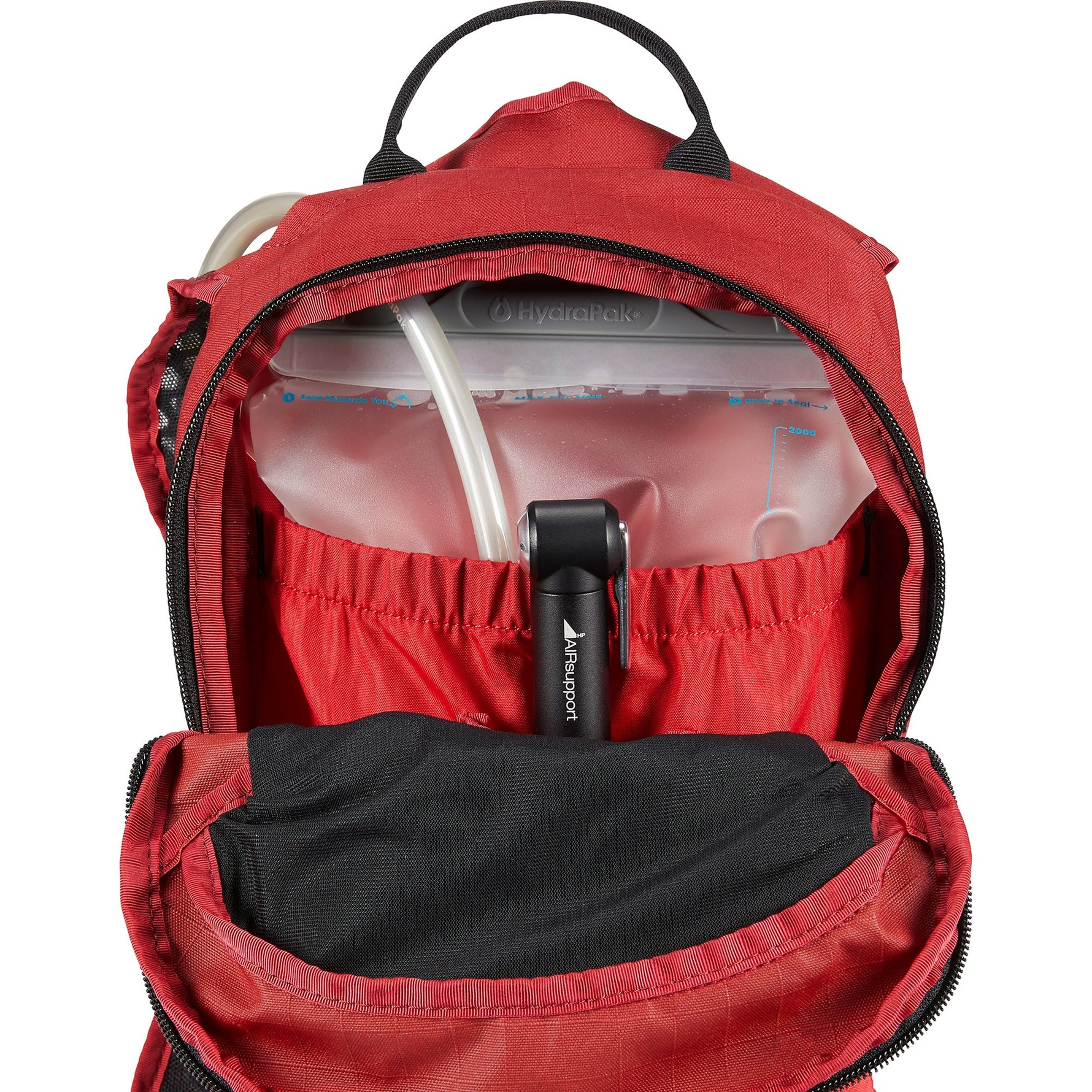 Dakine Shuttle 6L deep red backpack opened showing hydration bladder compartment