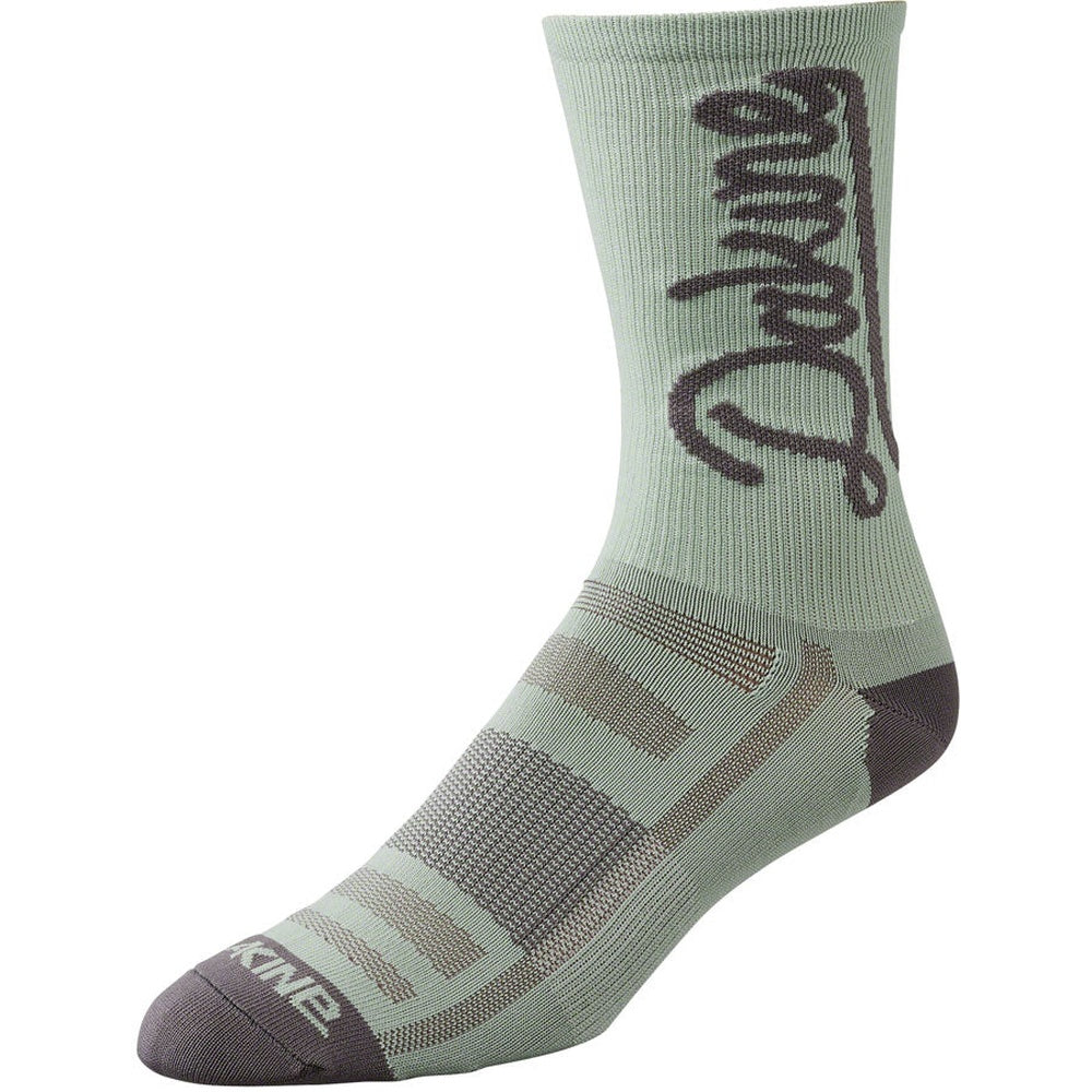 Dakine Singletrack Crew Sock in Desert Sage green with charcoal script logo and heel toe accents