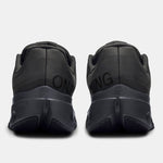 On Cloudsurfer Next men's running shoes rear view showing heel counter and On Running branding in black
