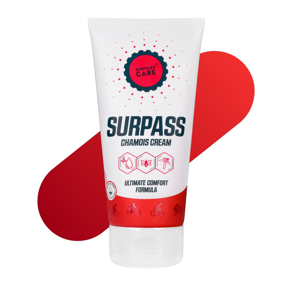 Surpass Chamois Cream white tube with red accents on clean background