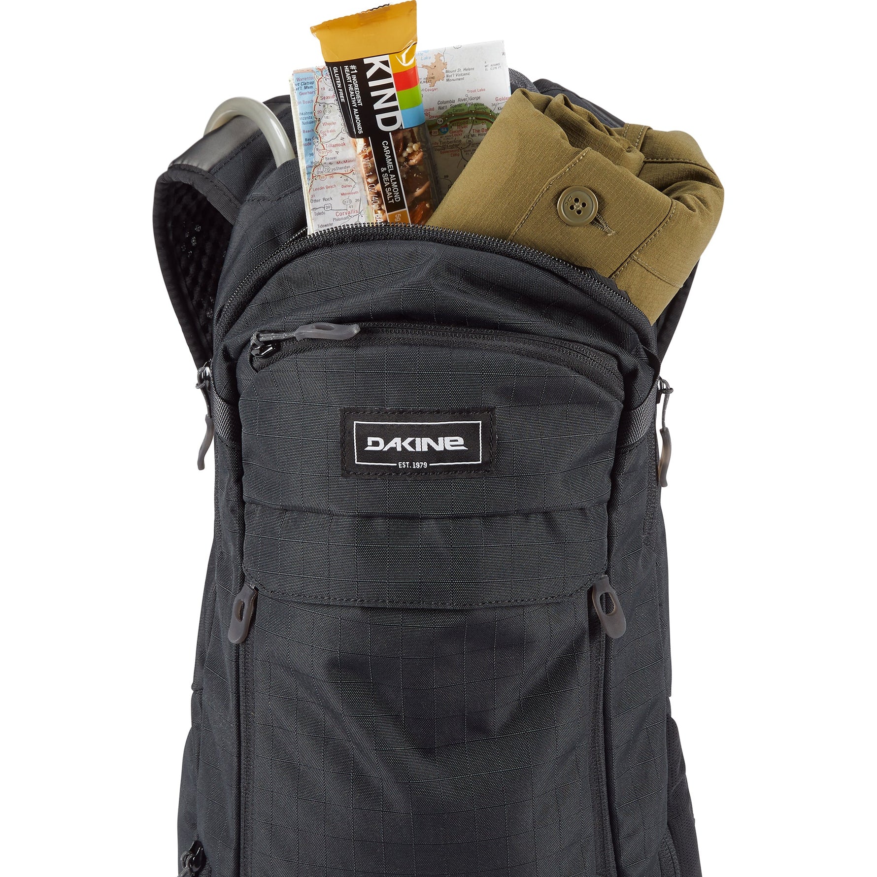 Black Dakine Syncline 12L backpack with contents showing organized storage compartments