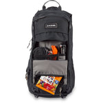 Dakine Syncline 12L black backpack open showing interior compartments with bike tools
