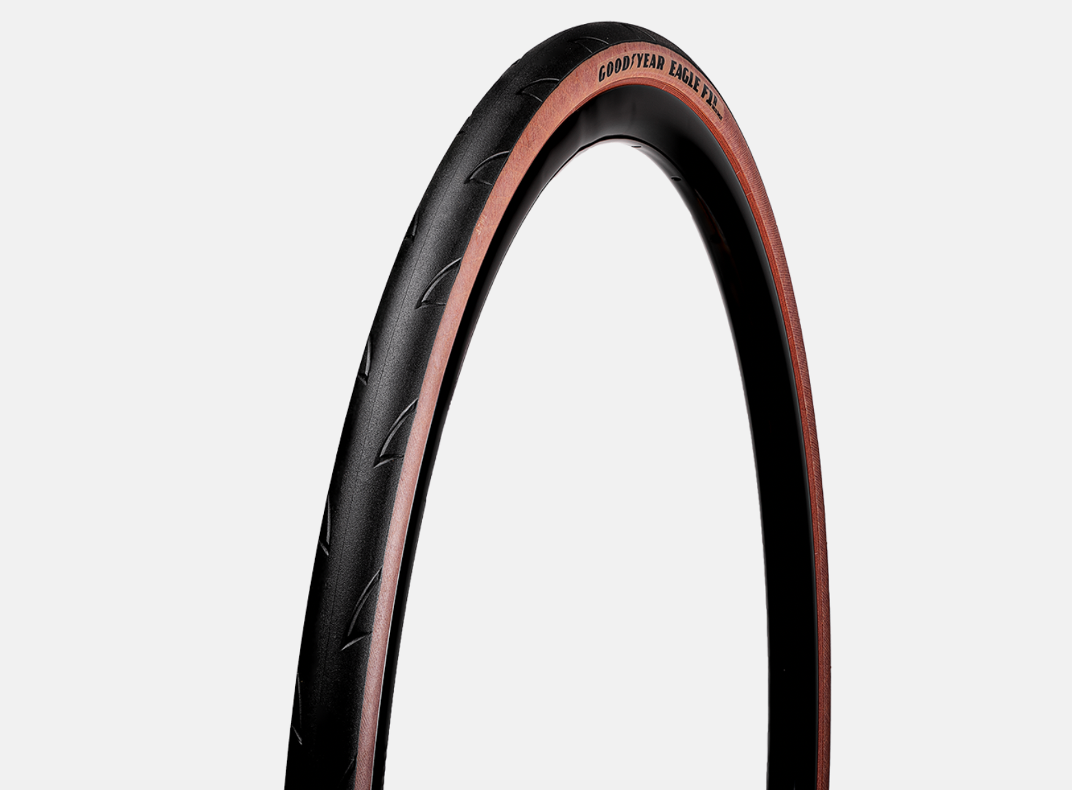 Goodyear Eagle F1 bicycle tire with black tread and tan sidewall