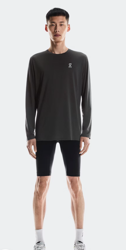 Man wearing On Core Long-T in dark gray with black shorts