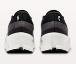 On Cloudmonster 2 running shoes rear view showing black gray colorway with white sole