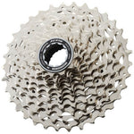 Shimano 105 CS-R7101 12-speed cassette sprocket with silver finish on white background