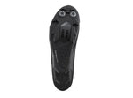 Black Shimano XC702 cycling shoe sole showing cleat mounting and tread pattern