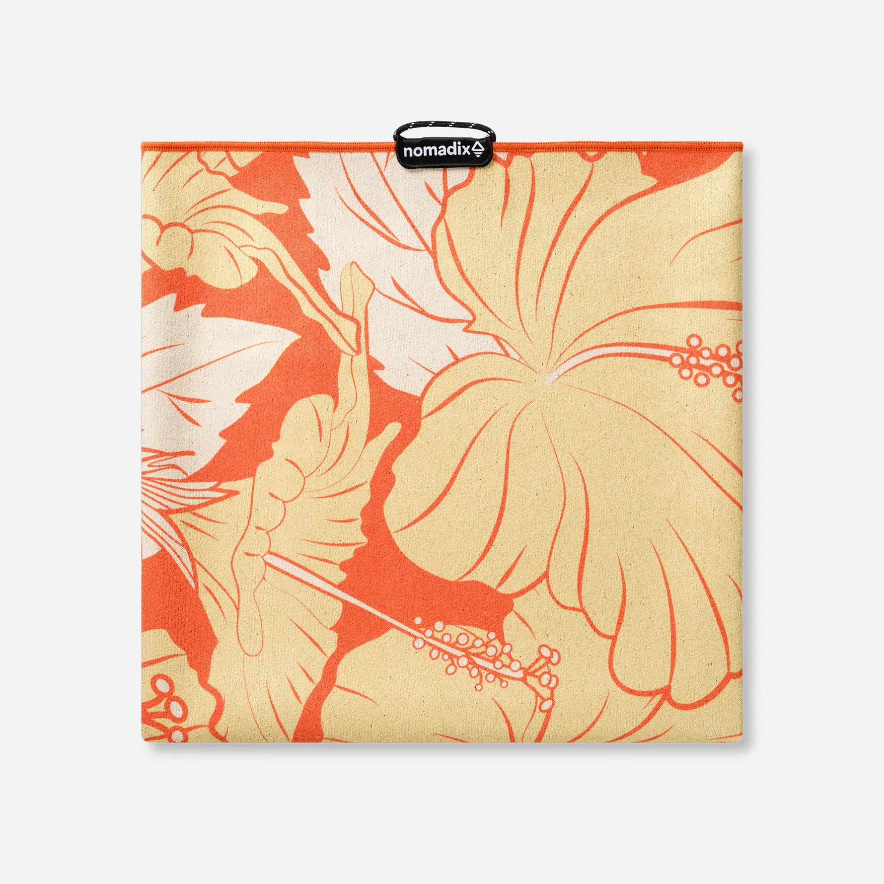 Nomadix orange tropical hibiscus print fitness towel with brand label