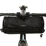 Black Almsthre bicycle handlebar bag mounted on bike with clean white background
