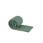 Sea To Summit Pocket Towel in sage green, rolled up and partially unfolded