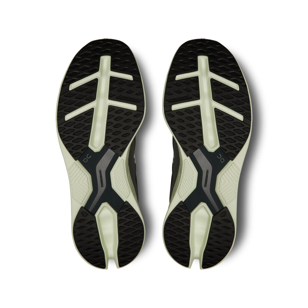 On Cloudeclipse running shoes sole view showing black and lime green outsole pattern