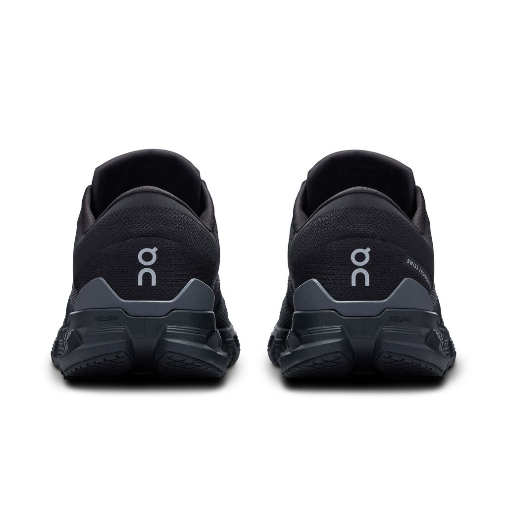 On Cloud X 4 running shoes in black and eclipse colorway, rear view