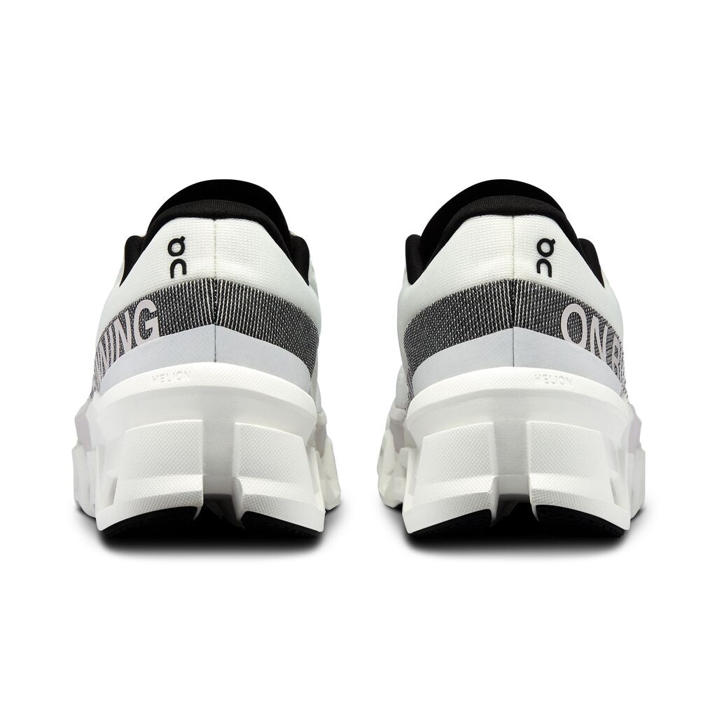 On Cloudmonster 2 running shoes in white and frost colorway, rear view