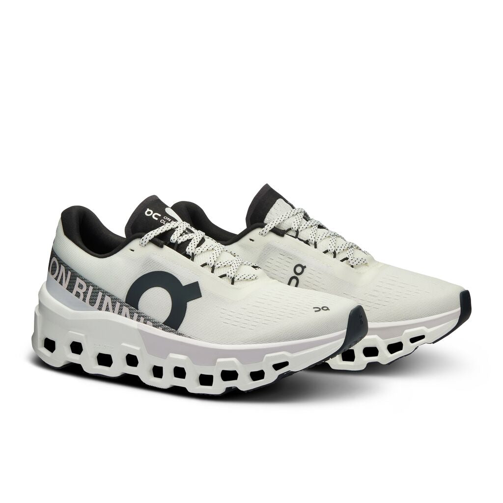 On Cloudmonster 2 running shoes in white and frost colorway with distinctive cloud sole