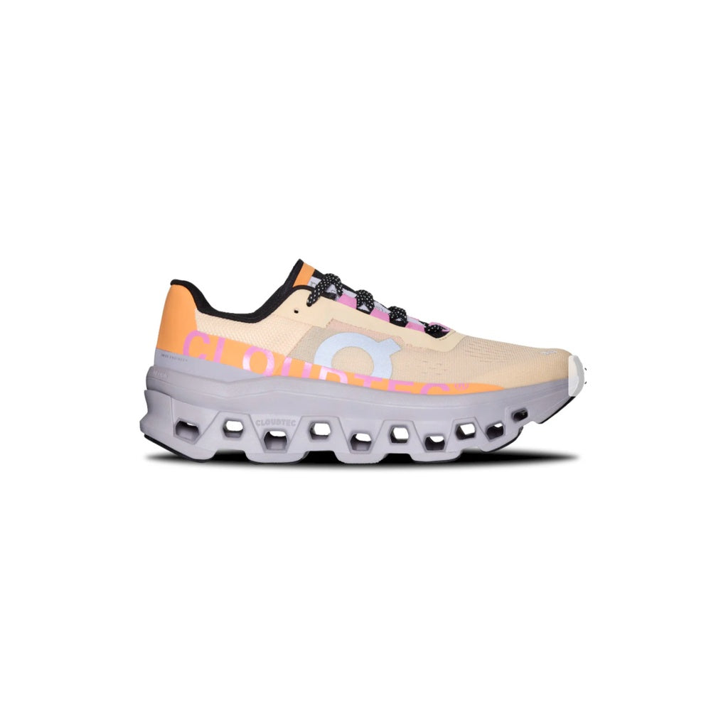On Cloudmonster women's running shoe in blonde with orange pink fade colorway