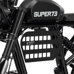 Black Super73 MOLLE panel with rectangular cutouts mounted on electric bike frame