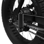 Black Super73 folding peg attached to bicycle frame showing textured grip surface