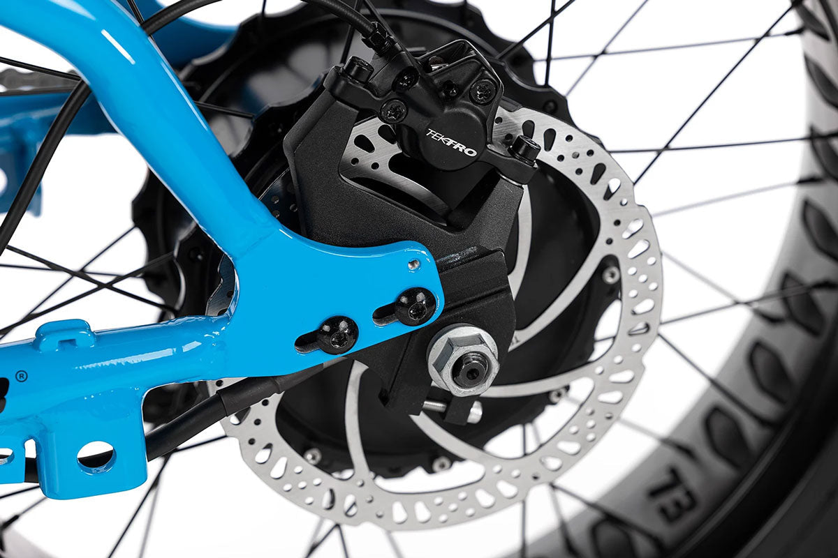 Close-up of Super73-R Brooklyn blue frame with Tektro hydraulic disc brake and hub motor