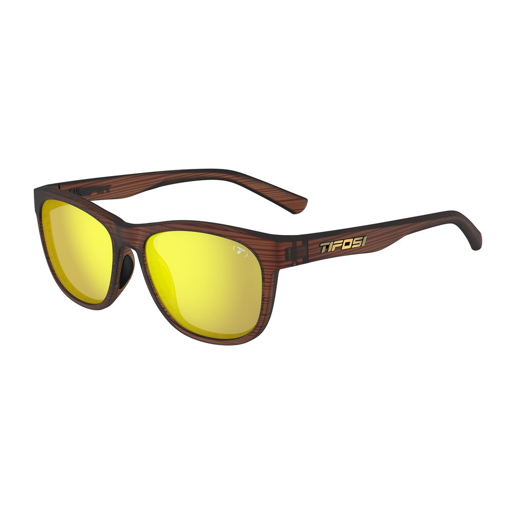 Tifosi Swank XL sunglasses in woodgrain brown frame with yellow polarized lenses