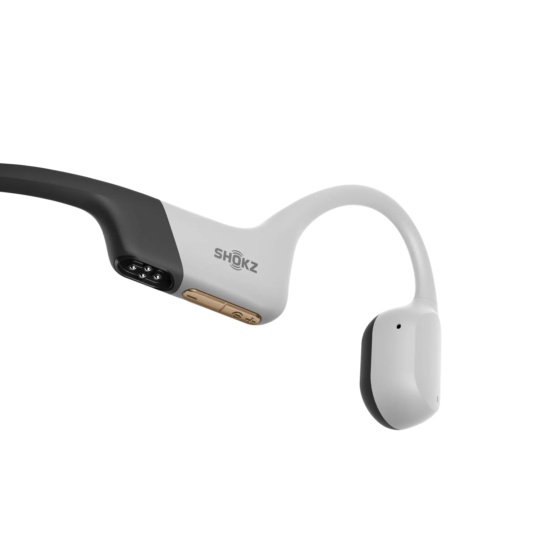 Shokz OpenSwim Pro bone conduction headphones in grey and black with charging cable