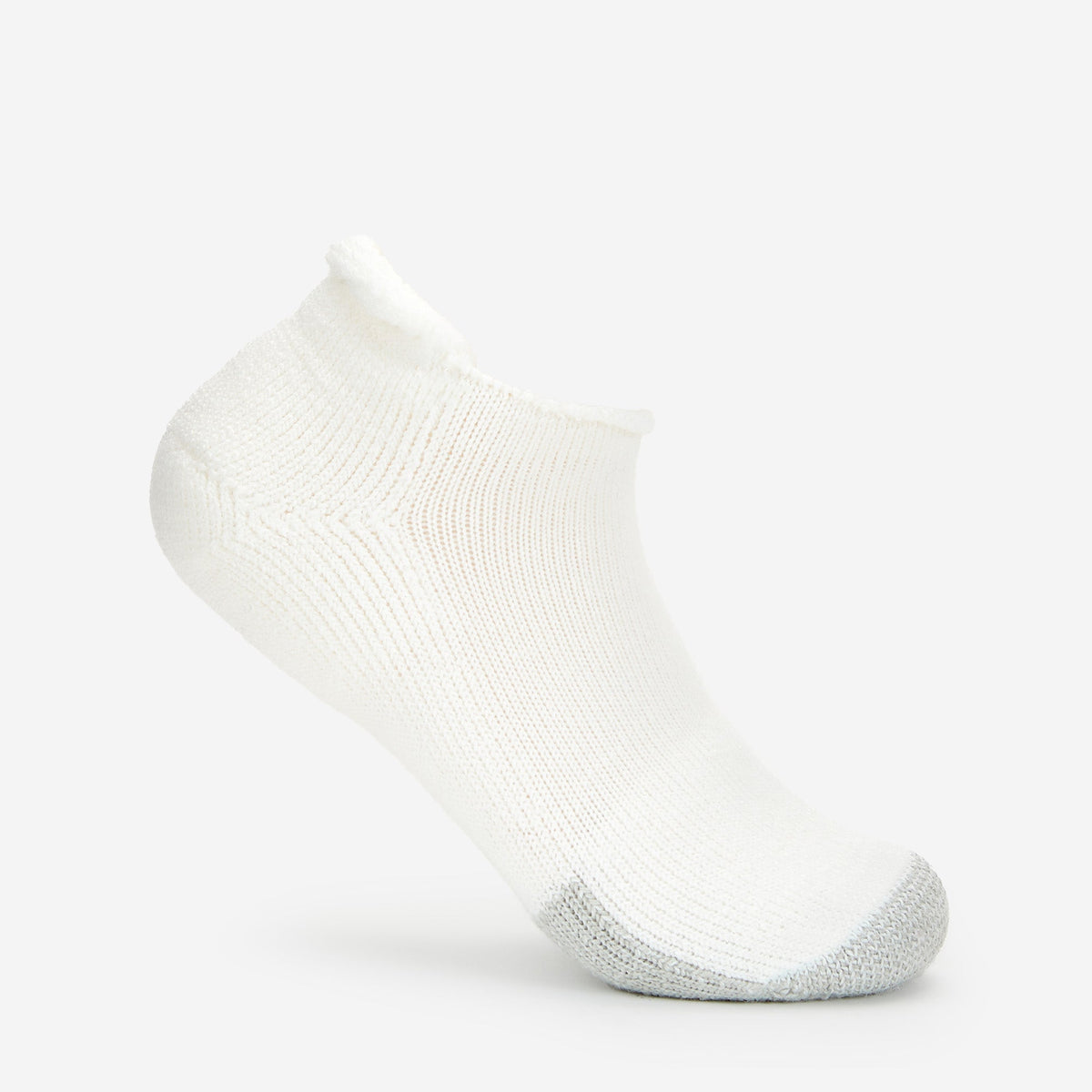 Thorlos white ankle tennis sock with gray toe cushioning and rolltop cuff