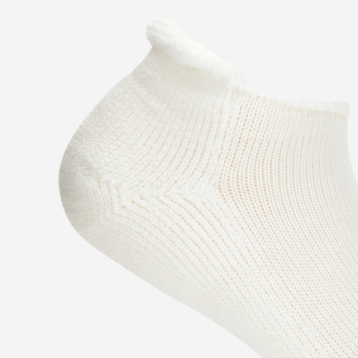 Thorlos white tennis ankle sock with thick cushion and rolltop cuff detail