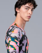 Side profile of male model wearing TheOneOff Krypton Short Sleeve Jersey in Bromine colorway