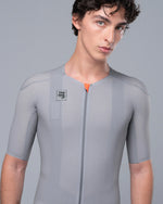 Male model wearing TheOneOff Krypton Short Sleeve Jersey in Future Gray, front detail close-up