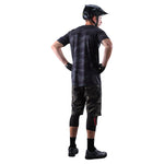 Troy Lee Designs Skyline MTB shorts in brushed camo military pattern on cyclist