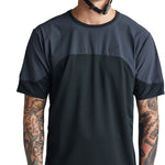 Troy Lee Designs Drift SS Jersey in dark charcoal carbon colorway worn by model
