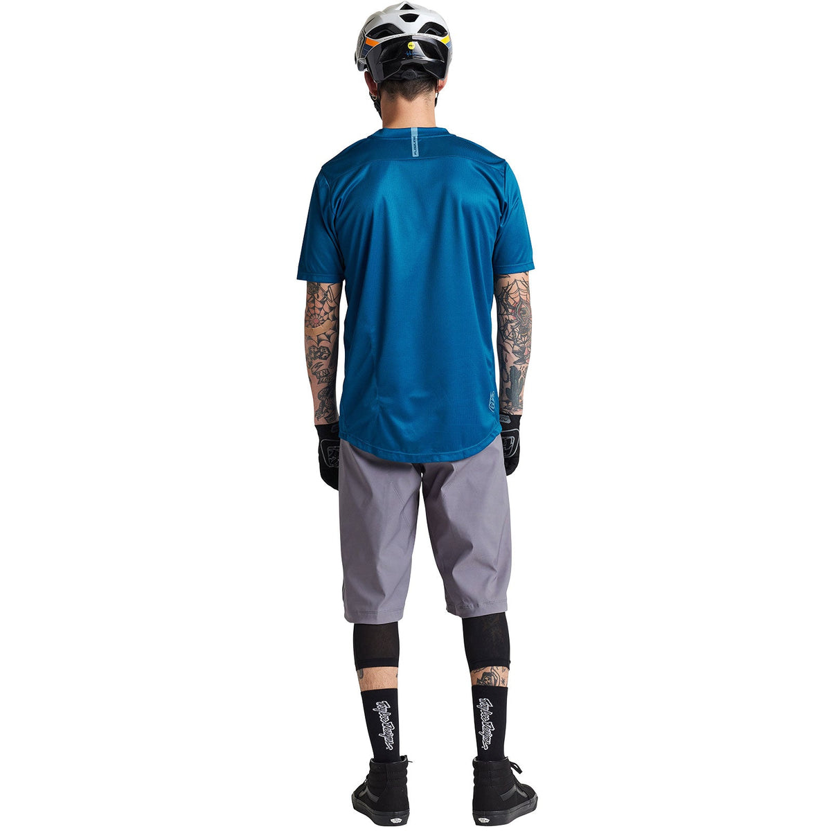 Troy Lee Designs Flowline Jersey in Slate Blue shown on male model from behind