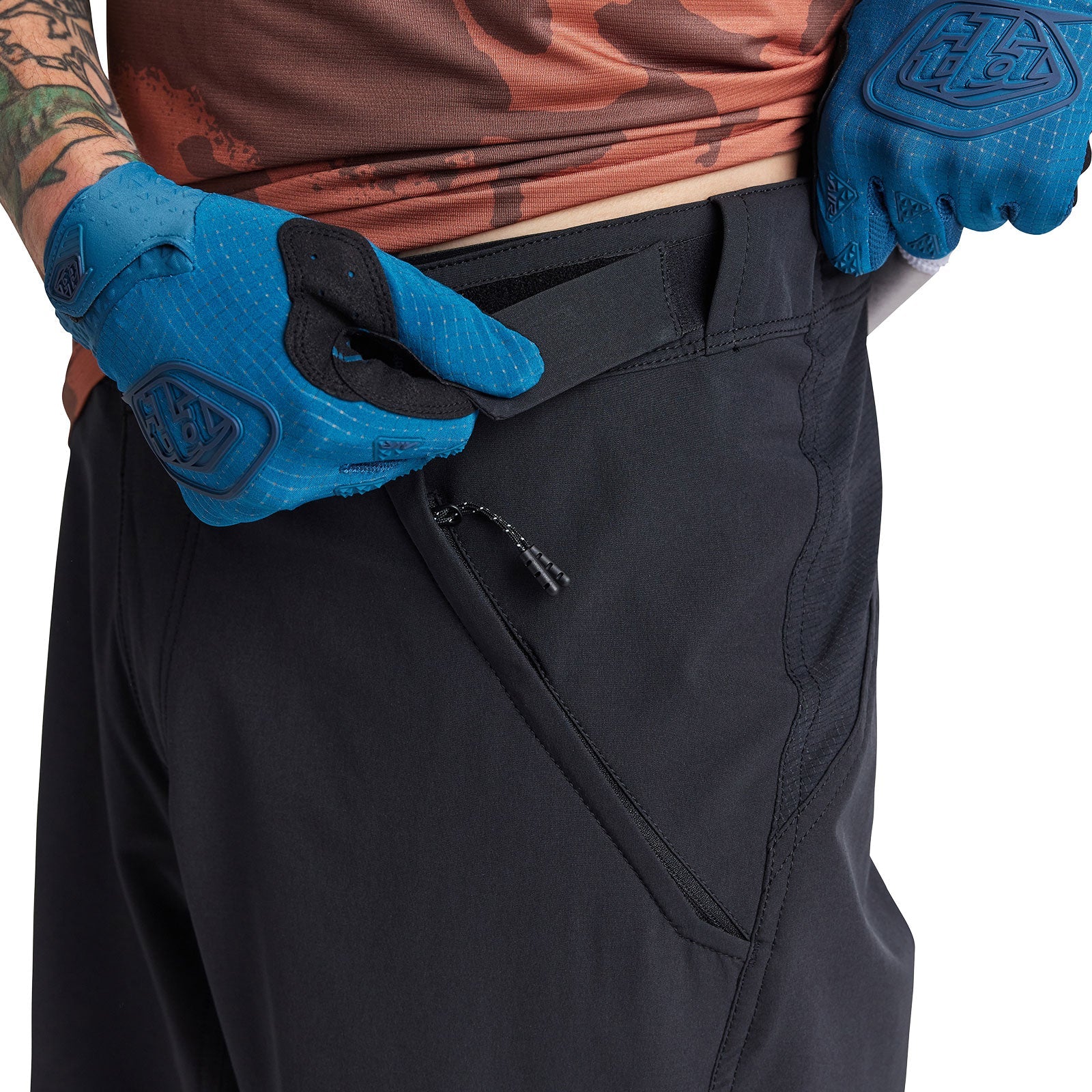 Troy Lee Designs black MTB cycling shorts with zippered pocket detail