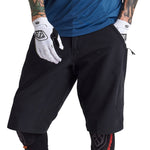 Troy Lee Designs black Skyline cycling shorts with liner on model