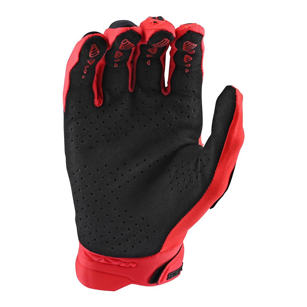 Troy Lee Designs SE Pro Glove in red showing palm side with black grip pattern
